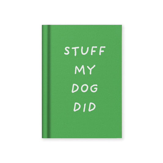 Green hardback fabric notebook with “STUFF MY DOG DID” text on the cover