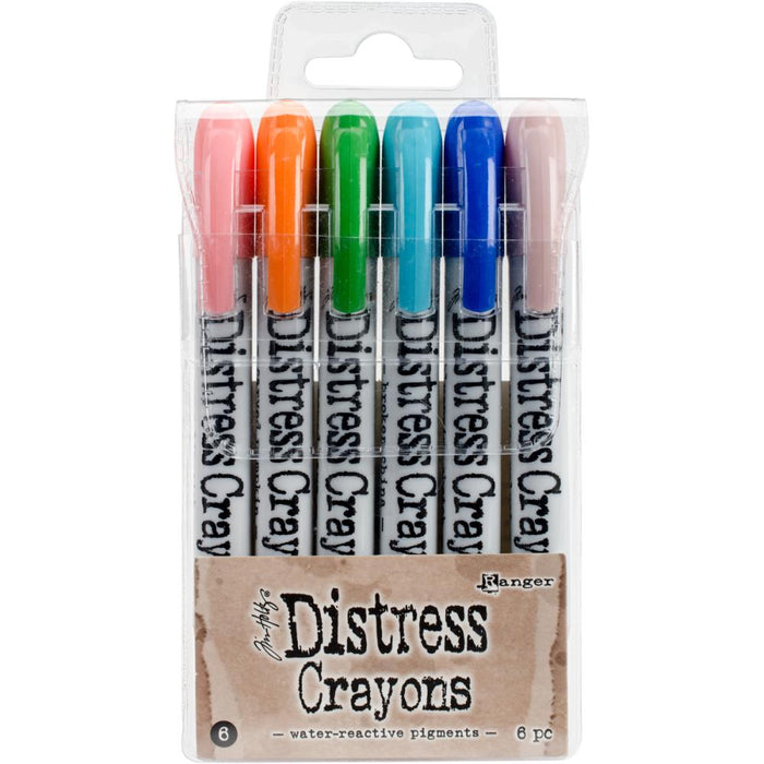 Ranger - Tim Holtz - Distress Crayon Set - Set #6. Distress Crayons are formulated to achieve vibrant coloring effects on porous surfaces for mixed-media. The smooth water-reactive pigments are ideal for creating brilliant backgrounds. Available at Embellish Away located in Bowmanville Ontario Canada.