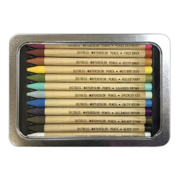 Tim Holtz - Distress Watercolor Pencils 12/Pkg Set 1. These are woodless watercolor pencils formulated to achieve vibrant coloring effects on porous surfaces. Water-reactive pigments are ideal for water coloring, shading, sketching, etc. Available at Embellish Away located in Bowmanville Ontario Canada.