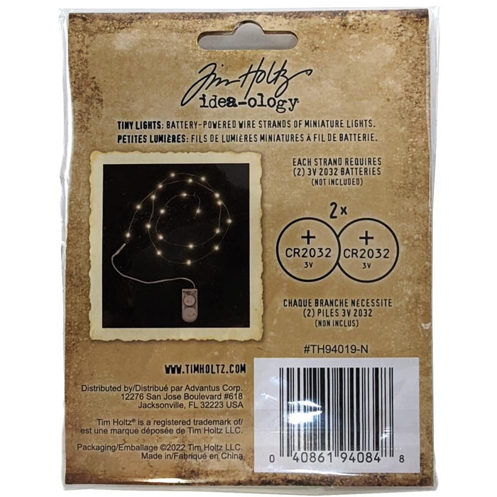 Tim Holtz - Idea-Ology Battery - Operated Wire Light Strands - 2/Pkg - Tiny Lights - Clear (No Batteries). While you need the perfect paper to start your project, you also need the perfect embellishment! Requires two 3V 2032 batteries, not included. Available at Embellish Away located in Bowmanville Ontario Canada.