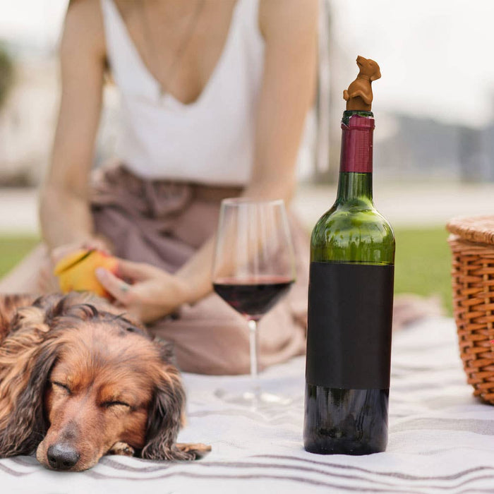Fred & Friends Winer Dog Dachshund bottle stopper on a cork, featuring a playful dachshund design for sealing wine bottles.
