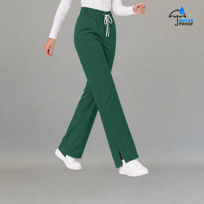 Women's bottle green 502 scrub pants walking pose with elastic drawstring waist — lightweight fluid-resistant medical scrub pants S-FOR-ME