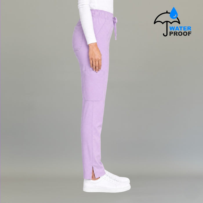 Side view of women's 502 lilac scrub pants showing cargo pocket and side slit hem — lightweight fluid-resistant nursing pants by S-FOR-ME