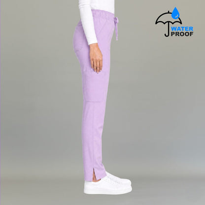 Side view of women's 502 lilac scrub pants showing cargo pocket and side slit hem — lightweight fluid-resistant nursing pants by S-FOR-ME