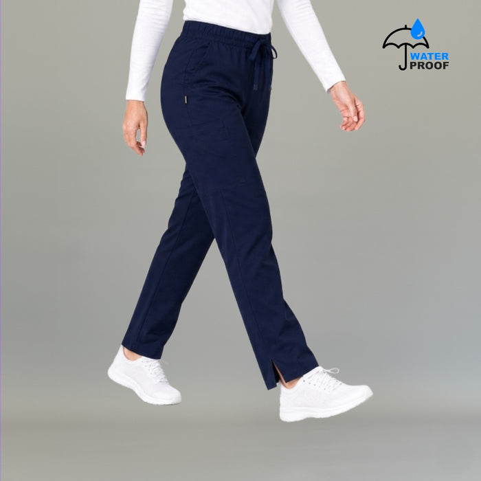 Side view of women's 502 navy scrub pants showing cargo pocket detail — lightweight fluid-resistant nursing pants by S-FOR-ME