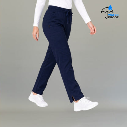 Side view of women's 502 navy scrub pants showing cargo pocket detail — lightweight fluid-resistant nursing pants by S-FOR-ME
