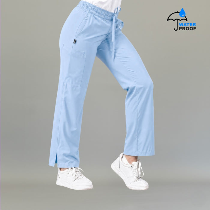 Side view of women's 502 sky blue scrub pants showing cargo pocket detail — lightweight fluid-resistant nursing pants by S-FOR-ME