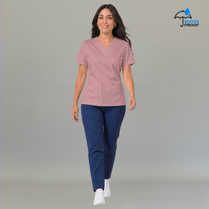 Full body view of women's 502 dusty pink scrub top lightweight walking pose — S-FOR-ME fluid-resistant nursing uniform