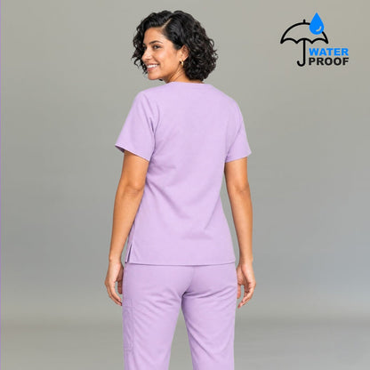 Back view of women's lilac lightweight scrub top 502 showing clean finish and side vents — fluid-resistant nursing uniform S-FOR-ME