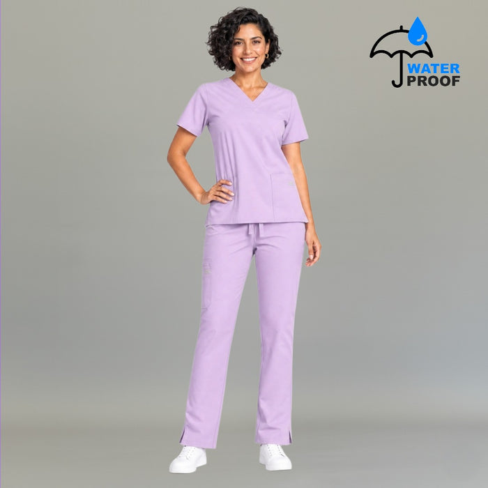 Full body view of women's 502 lilac scrub set with hand on hip — lightweight fluid-resistant medical uniform S-FOR-ME