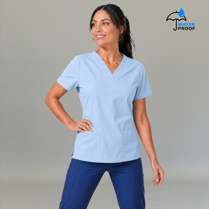 Women's sky blue lightweight scrub top 502 V-neck with hand on hip — fluid-resistant medical uniform for nurses by S-FOR-ME